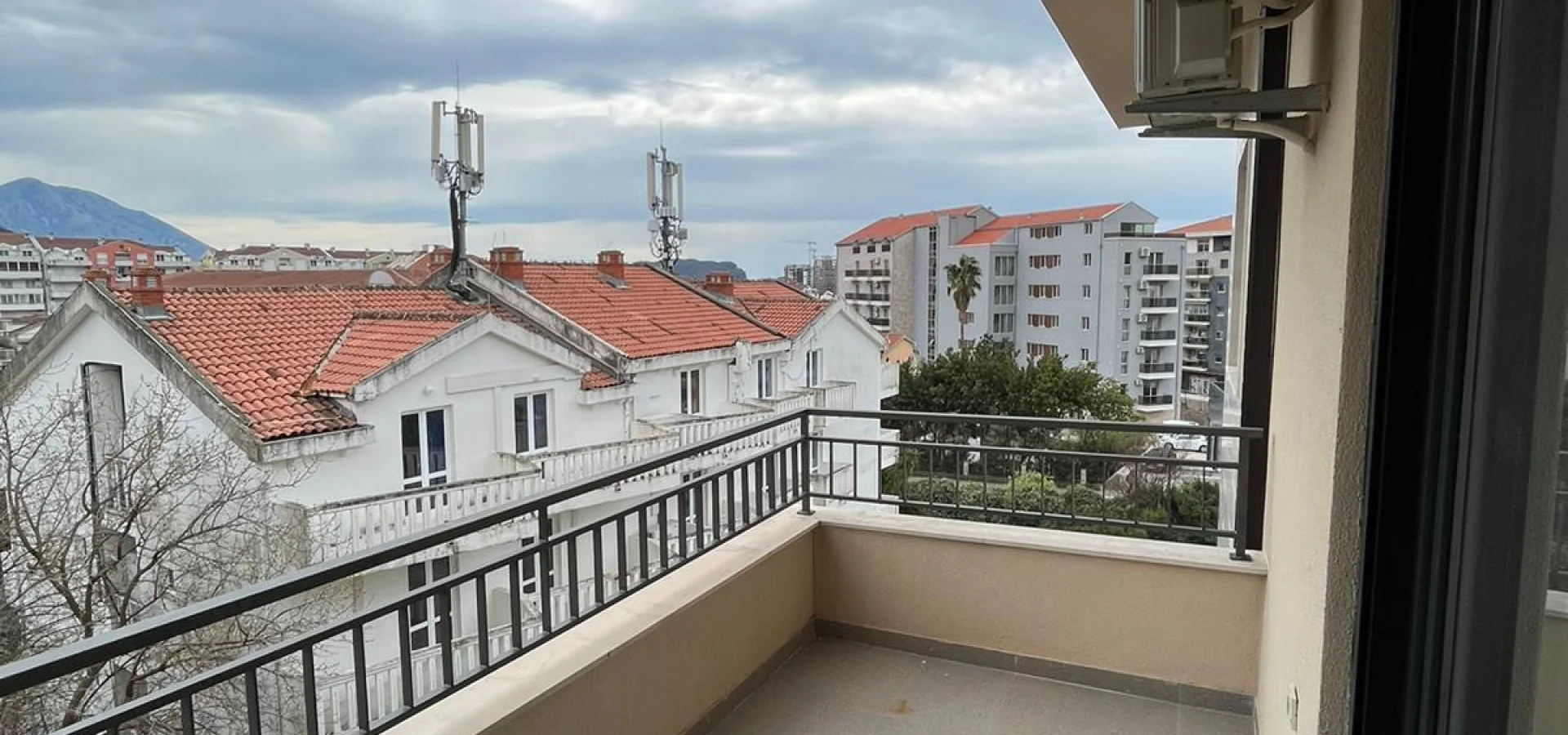 Modern and Spacious 1-Bedroom Apartment in Budva with Mountain and City Views
